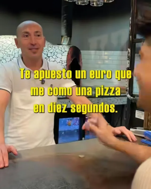 Fotograma de un reel grabado en la pizzería Makekosa Gourmet, con el rótulo «Te apuesto un euro que me como una pizza en diez segundos»